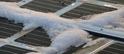 zonnepanelen onder sneeuw